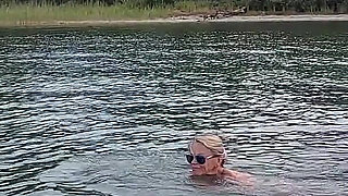 Sexy Granny Swims Naked in a Lake!