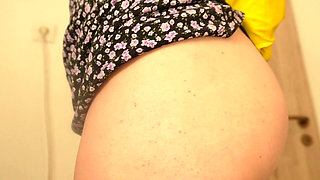 Indian stepsister masturbates in yellow dishwashing gloves and shows off her sexy skirt and big ass while playing with her pussy