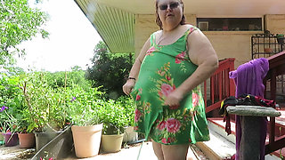 Out doors drying off after my hosing lol and putting on a sun dress while you watch! Thanks have a great weekend!