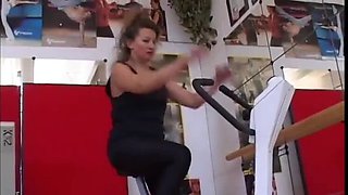 Horny MILF at the gym seduces her trainer into anal and blowjob