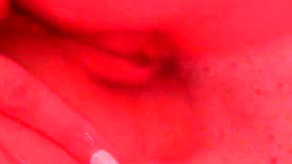 A Girl with an Excellent Figure Has Fun in the Bathroom with a Dildo