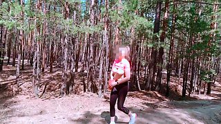 Hot MILF walks and runs in the Forest braless and without