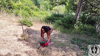 Gasoline Chainsw Naked Girl Cutting Branches