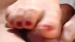 Kelly Performs a Technical Footjob Bringing Dominik's Cock to a Squirting Orgasm.