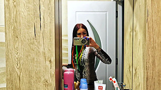 Strap-on Play in the Restroom.