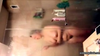 curvy stepmom 51 shaving her pussy in the shower